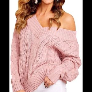 Pink off the shoulder baggy sweater.